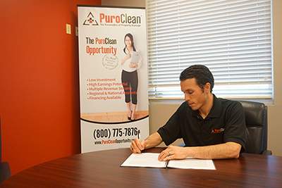 Puroclean Agreements and Sign