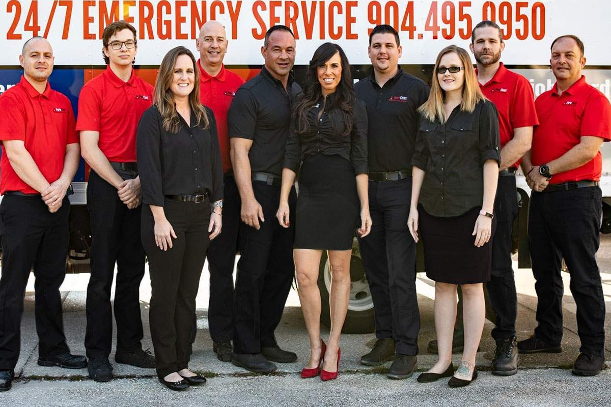 PuroClean Franchise Owners pose for a photo