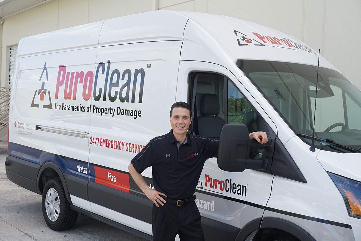 PuroClean franchisee with company van