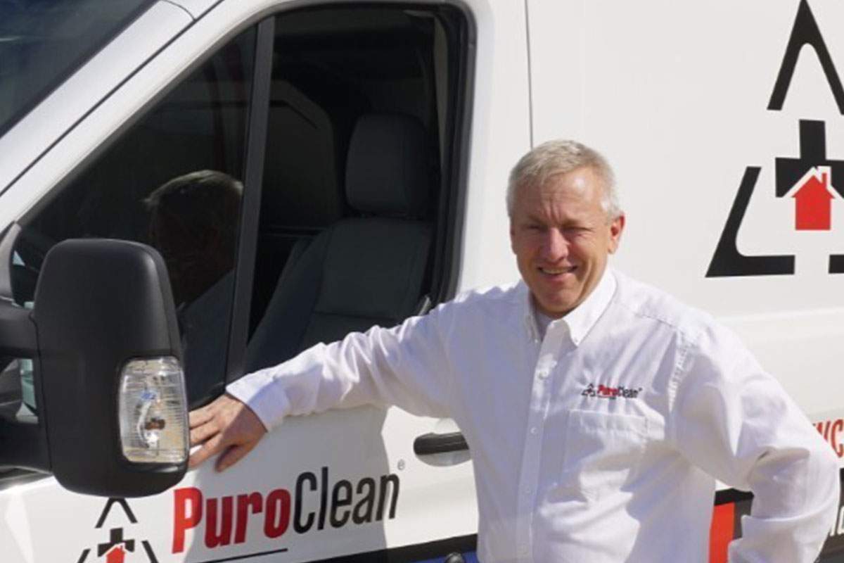 PuroClean Franchisee with a company truck