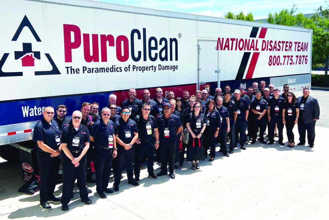 PuroClean team and a large truck