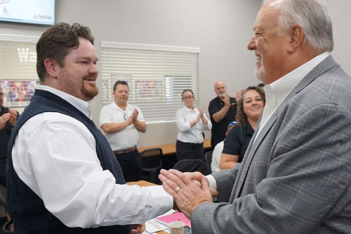 two men handshaking