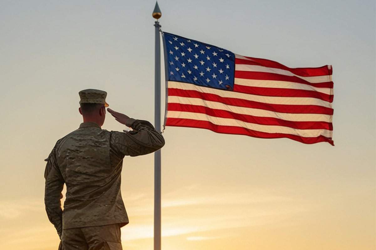 A veteran wearing his uniform salutes the flag at dusk