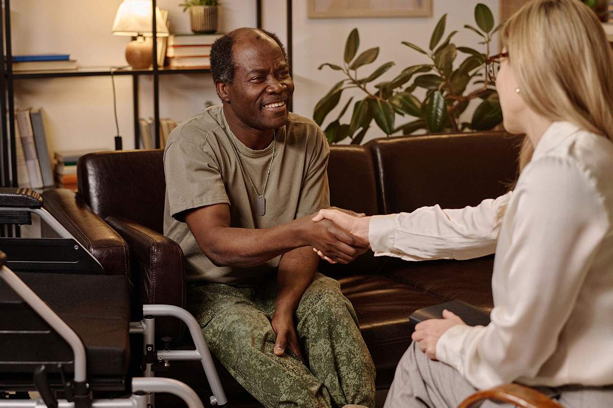 Disabled veteran shakes hands, ready to embark on new career